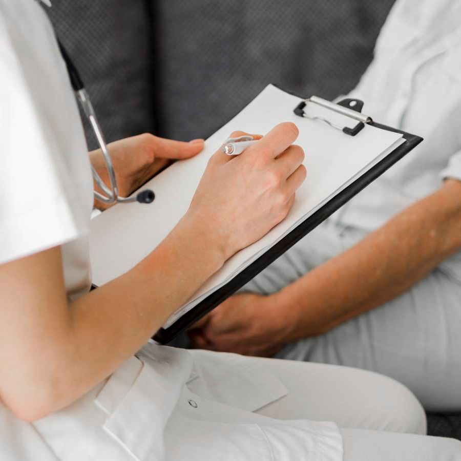 close up doctor taking notes 1